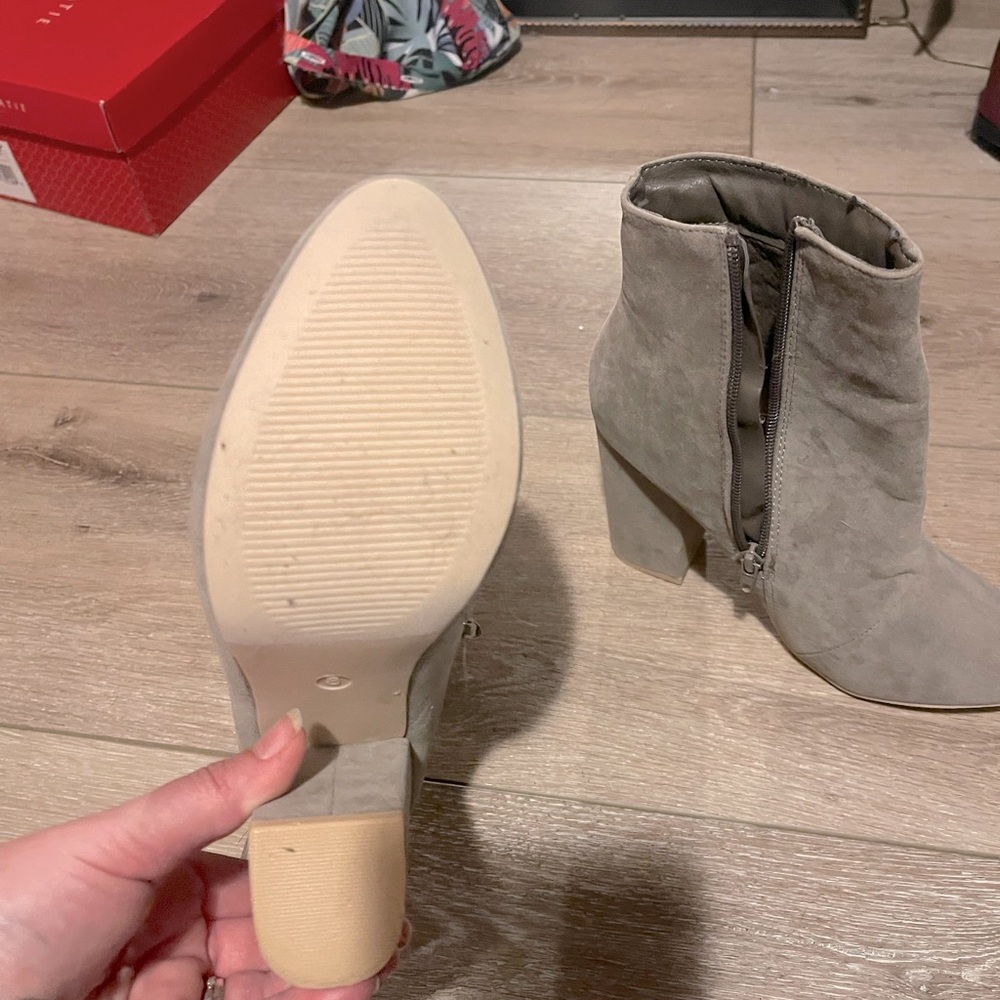 Tan Suede short heeled boots.